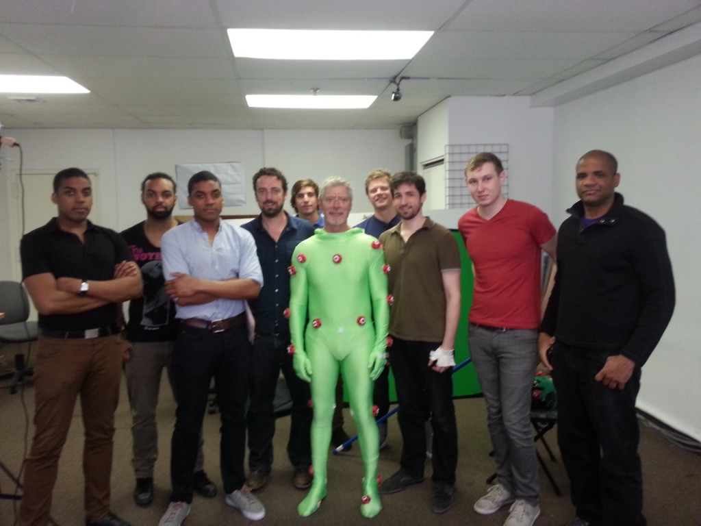 Stephen Lang (center) poses with some of the production team members at Omega Darling.