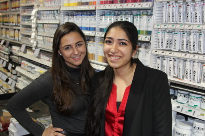 Parsons students and senate members, Margaret (Maggie) Cavaliere and Kulveen Sarna shop for paint at the Utrecht Art Supplies store on 13th Street on Oct. 7, 2015. (Photo/Morgan Young)