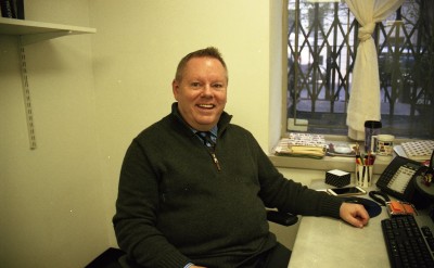New School advisor William Fetty at his desk in The New School's 11th St. advising office.