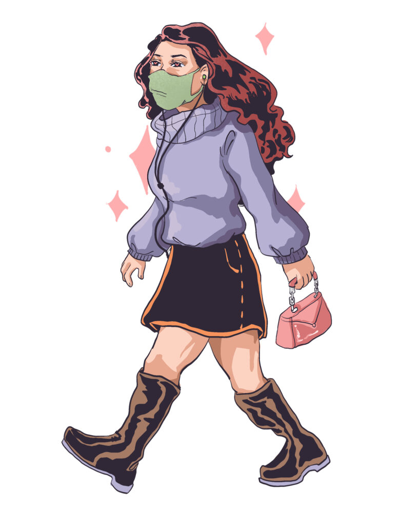 A girl wearing winter-y clothes and a face mask walks whilst listening to music through headphones