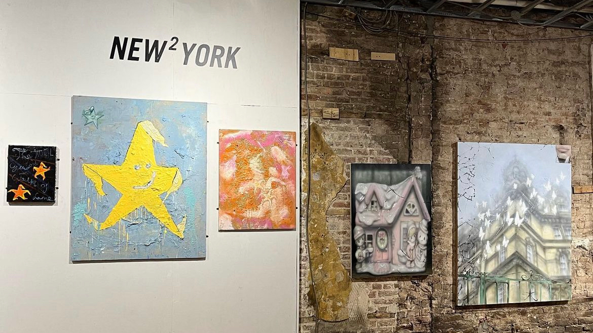 The entrance to the New2York exhibition, with the titular wall text and a series of the artists' paintings.