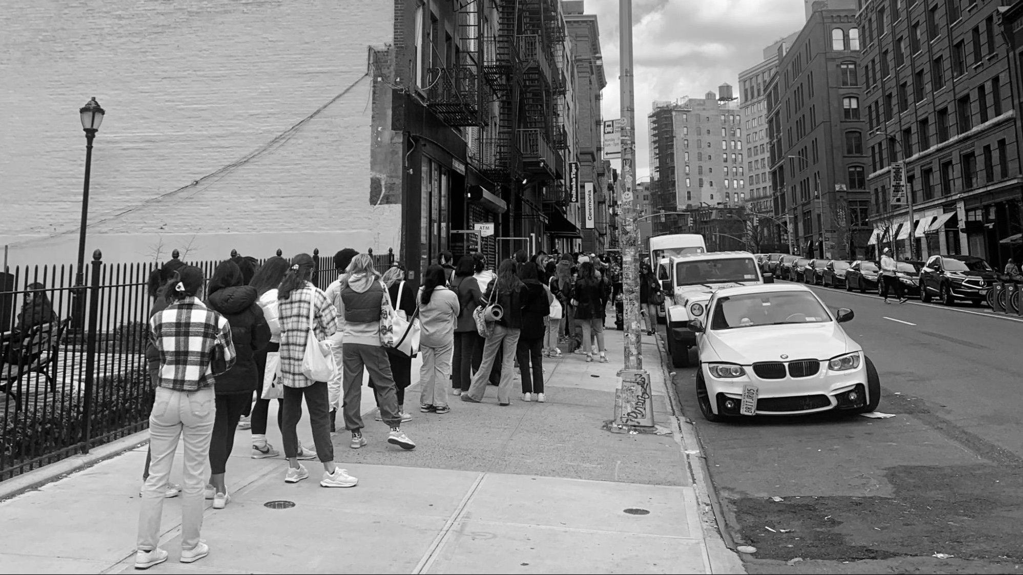 Image of multiple people lined up on Lafayette Street for Detoure’s pop-up thrift event