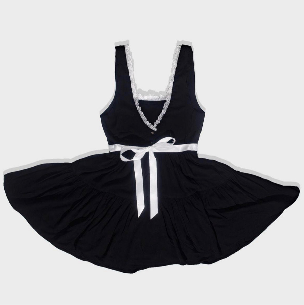Black dress with white ribbon and lace detailing