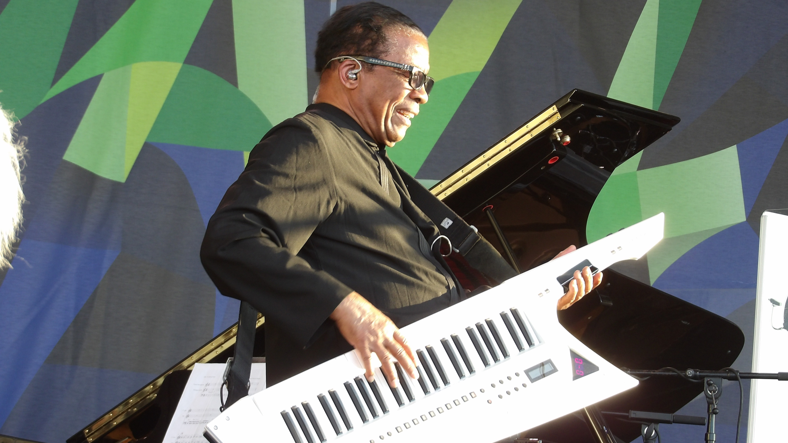 Herbie Hancock playing keytar onstage in Newport, RI.