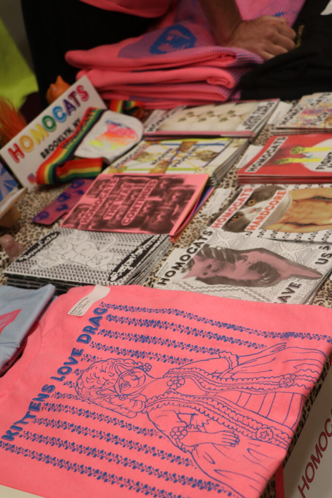 Zines lay out on a table. 