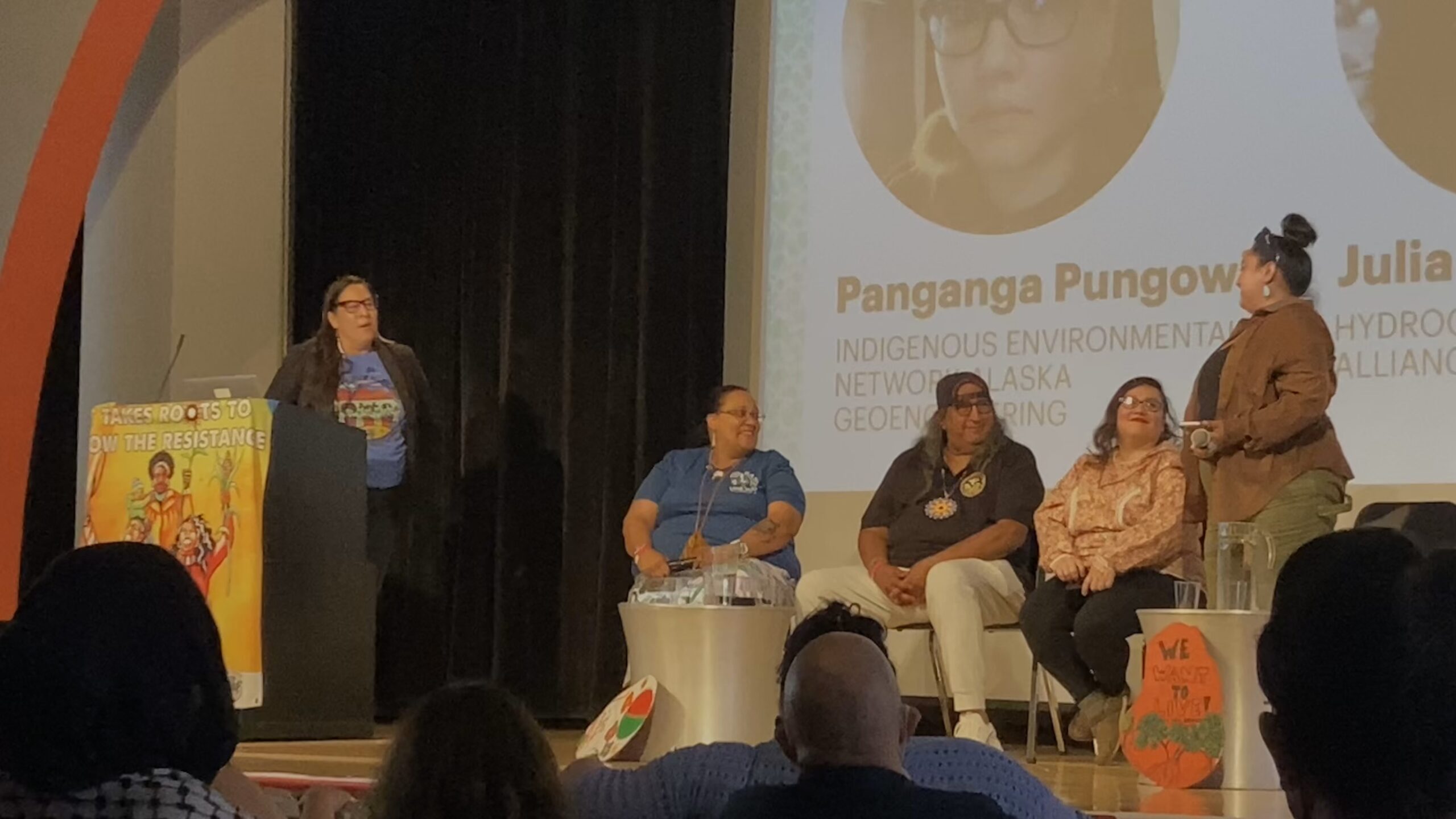 Photo of indigenous activists on stage introducing themselves.