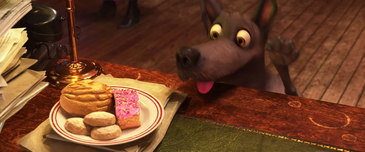 A screen capture from the movie “Coco” where a dog can be seen jumping up on a table to reach some pastries.