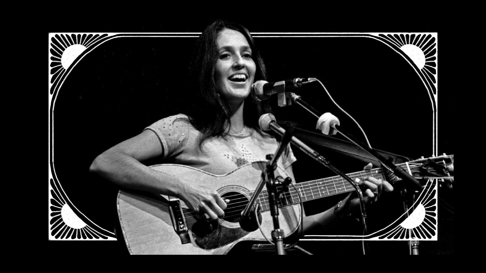 A black and white photo of Joan Baez playing guitar in front of a microphone stand with a hand drawn border around the photo