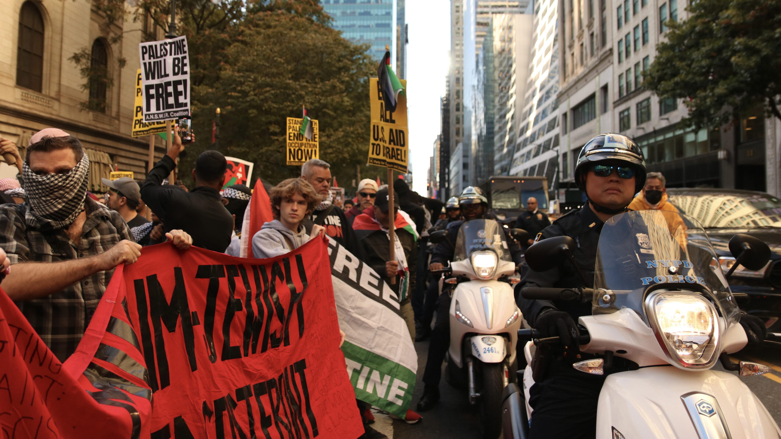 Photo of pro-Palestine protesters and police near Times Square.