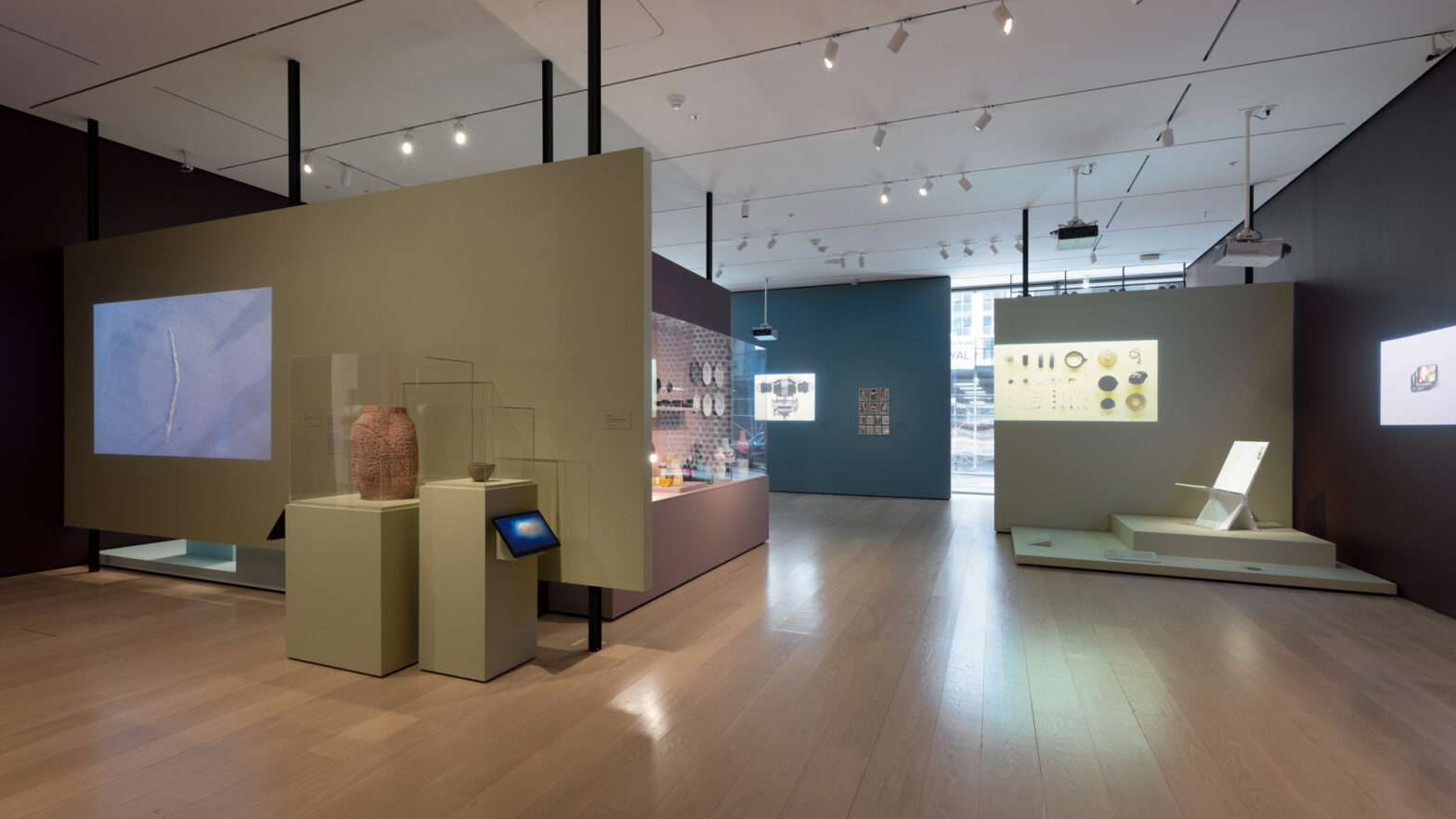 A room contains a variety of vases, glasses, and works from the MoMA exhibition “Life Cycles: The Materials of Contemporary Design.”