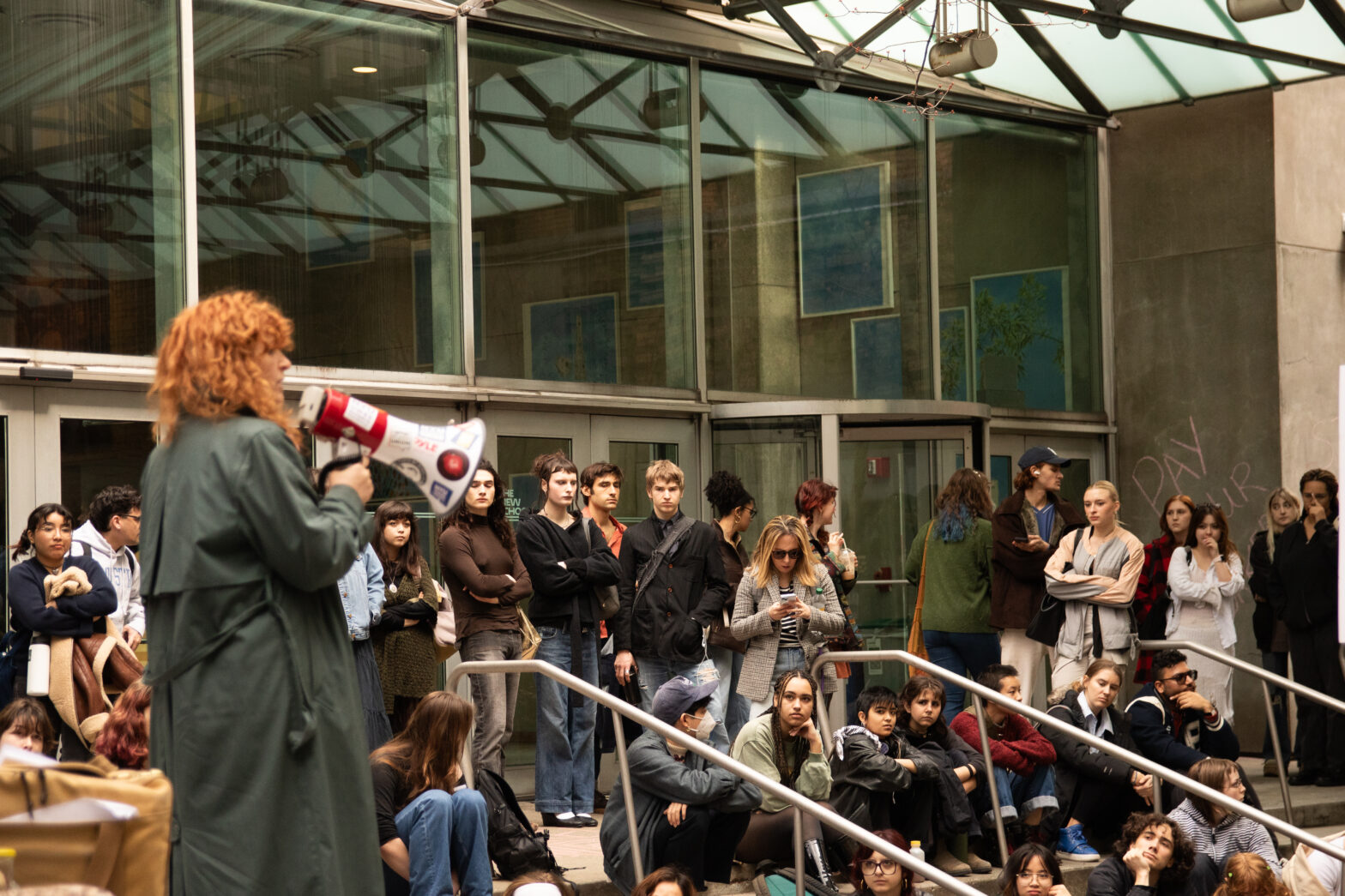 Union members speak to crowd during strike school