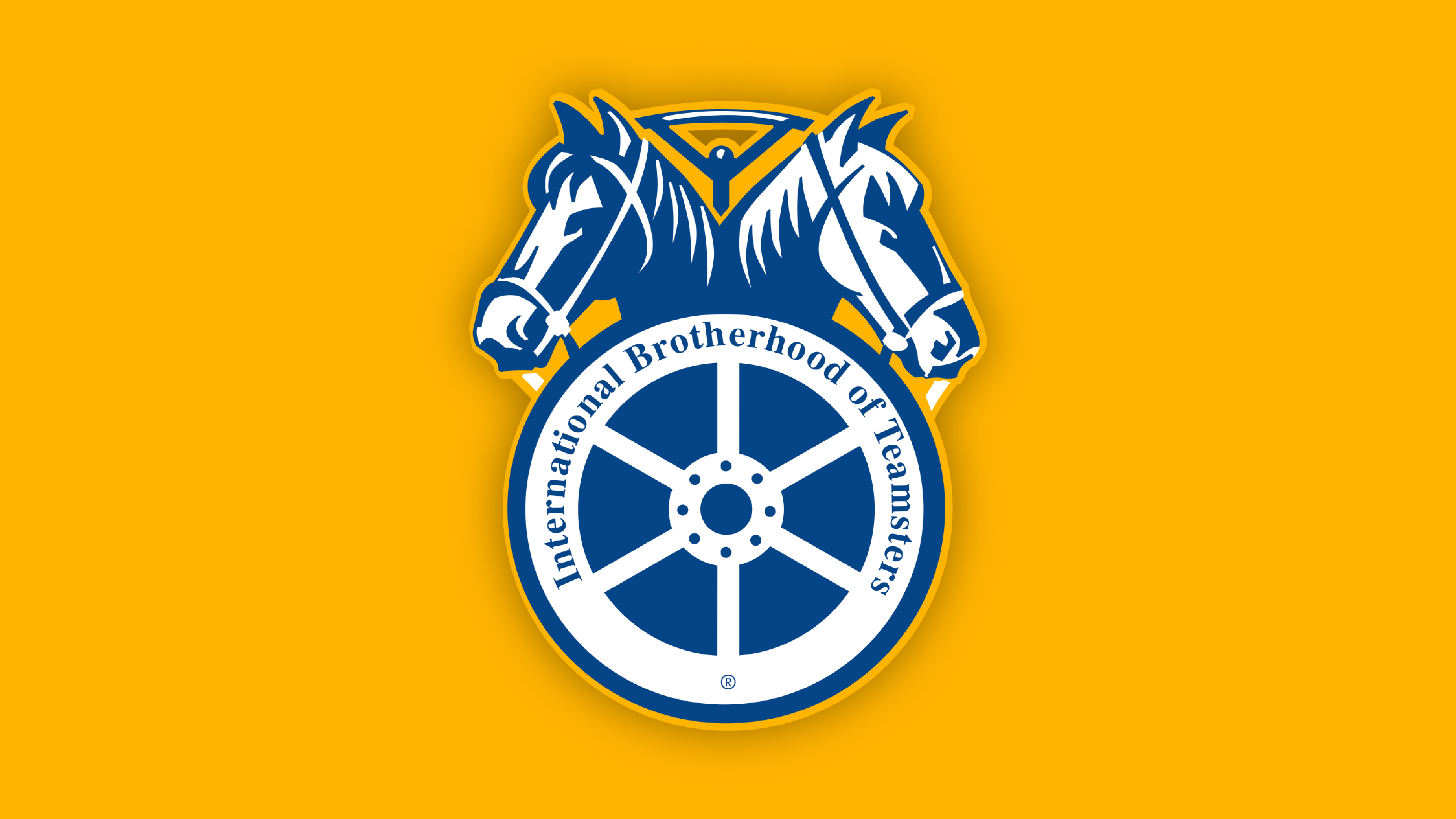 Logo of the International Brotherhood of Teamsters featuring two horse heads and a wheel set against a yellow background.