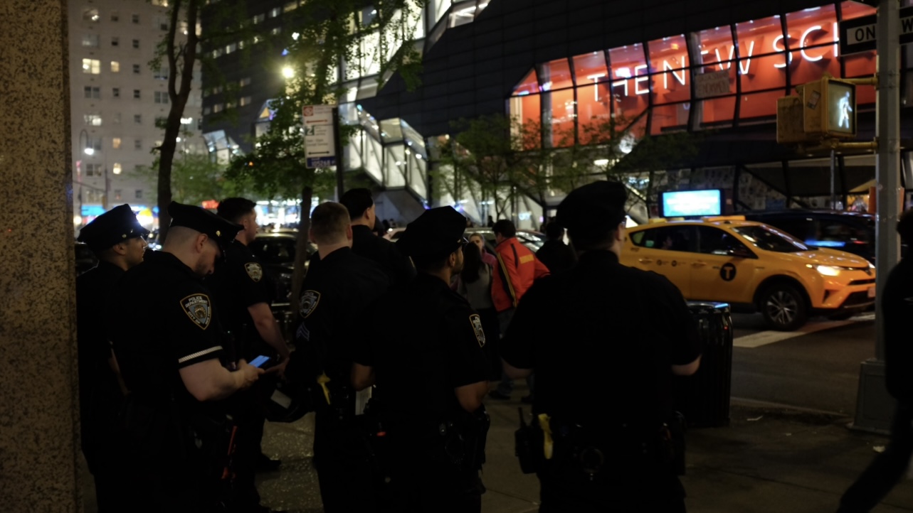 NYPD officers monitoring a student demonstration