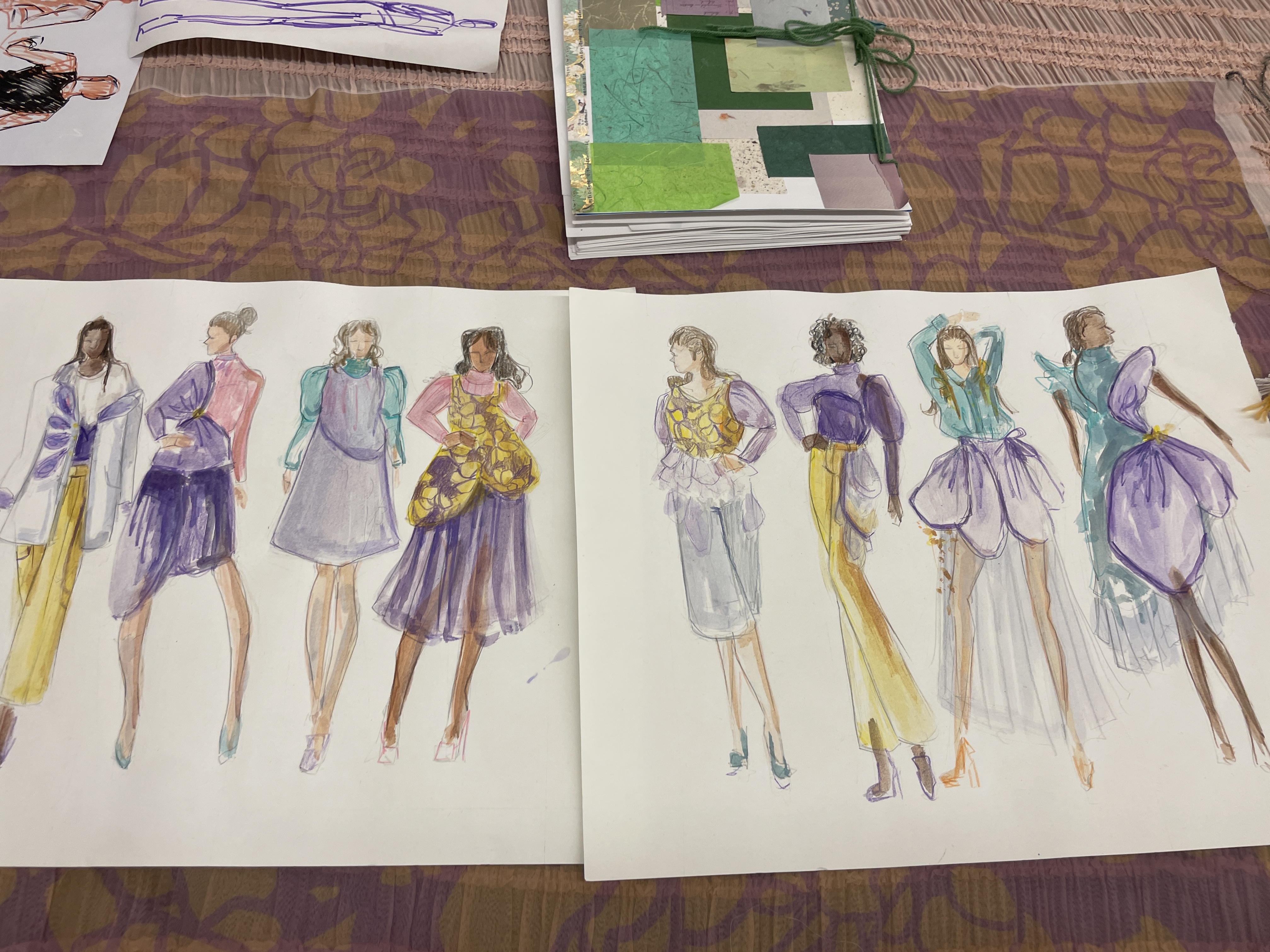 Eight watercolor fashion illustrations of yellow, purple, and green outfits on models of various skin tones