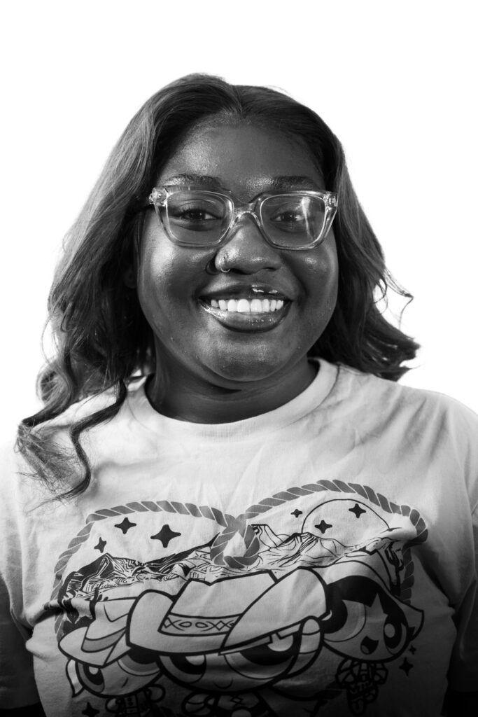 Headshot of Meyah Henry, black and white, on white background 