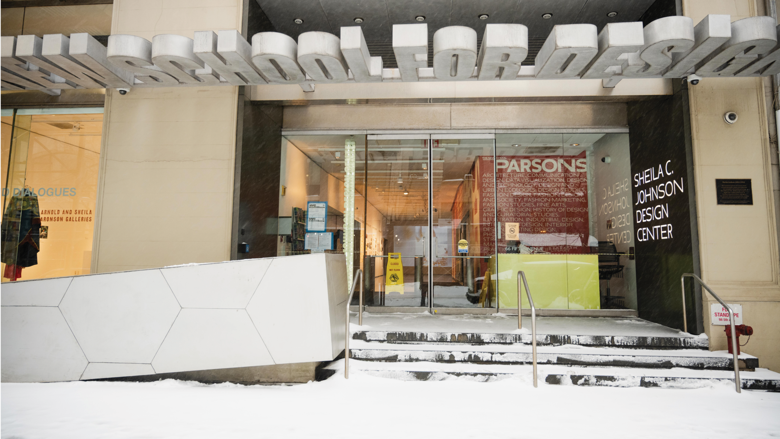 The entrance to The Sheila C. Johnson Design Center covered in snow at the New School.